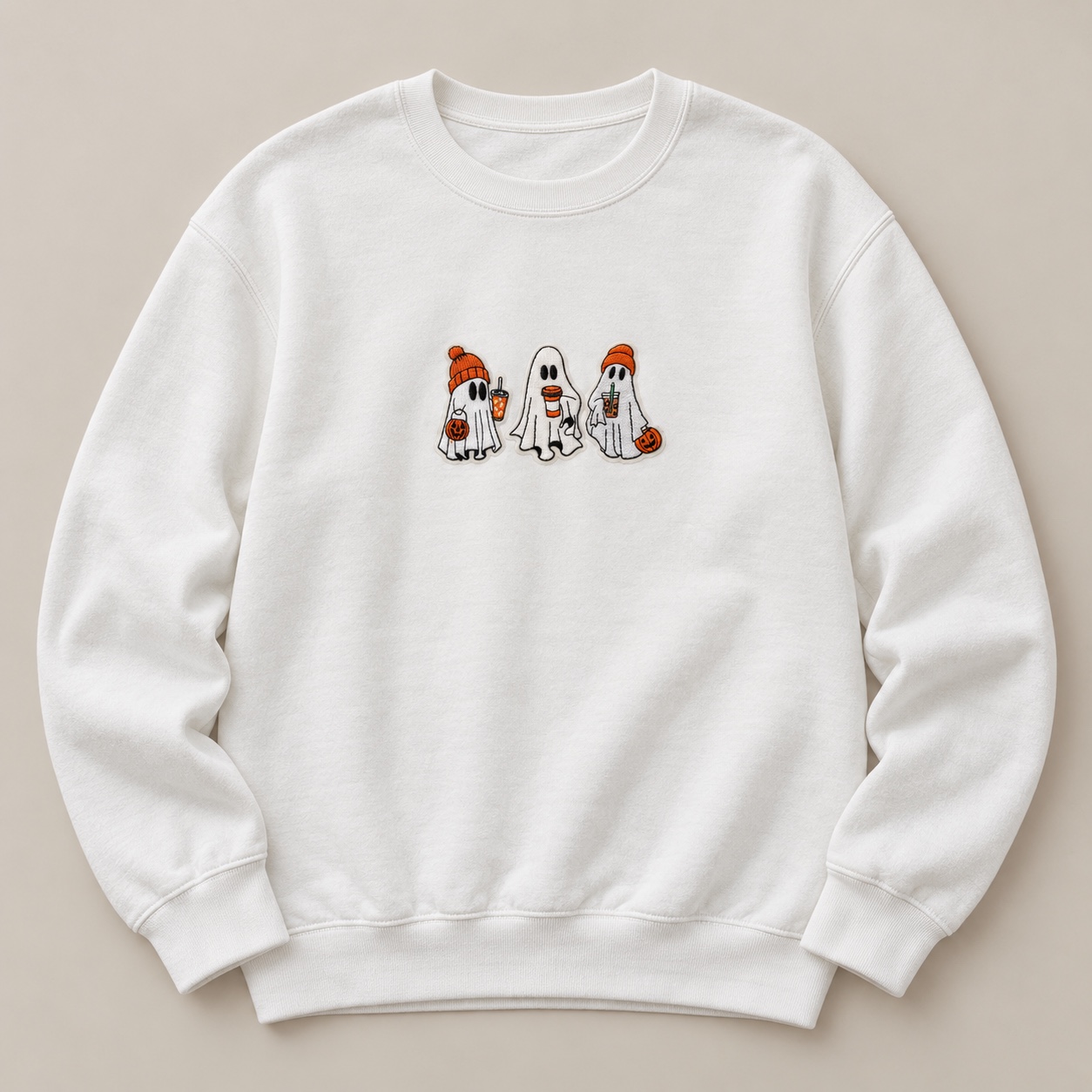 White crewneck sweatshirt with three Halloween ghost patches