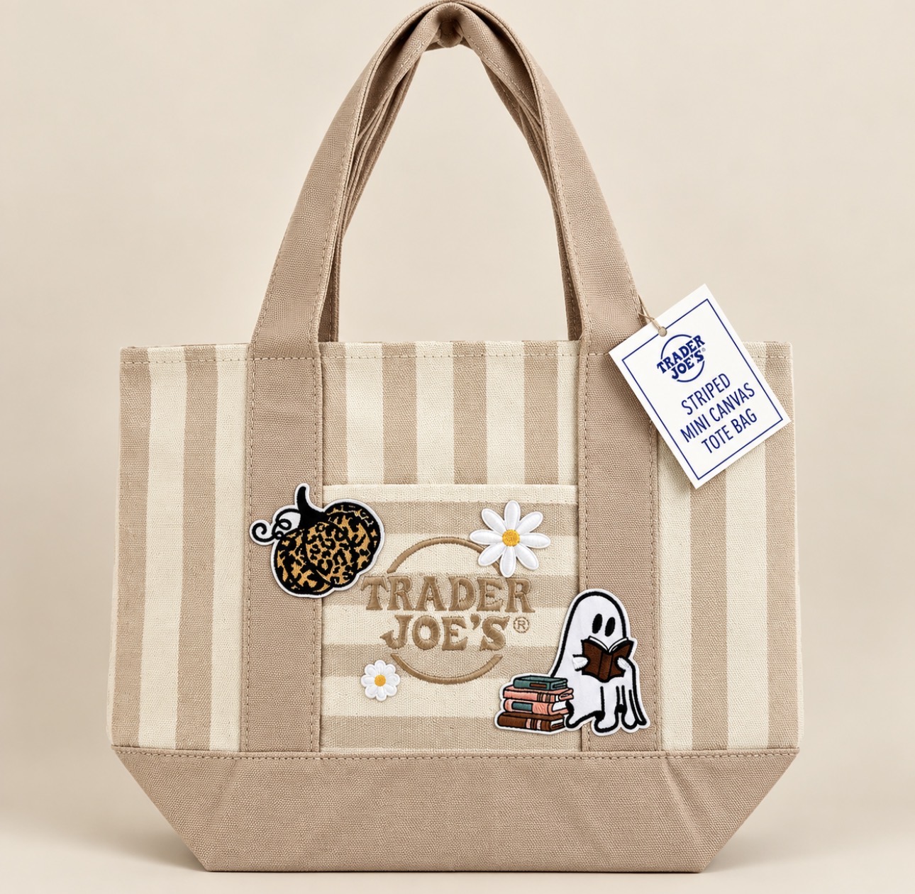 Striped Trader Joe's mini tote with pumpkin, flower and reading ghost patches
